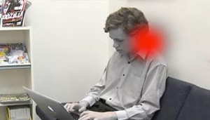 Image showing neckpain using laptop on laps
